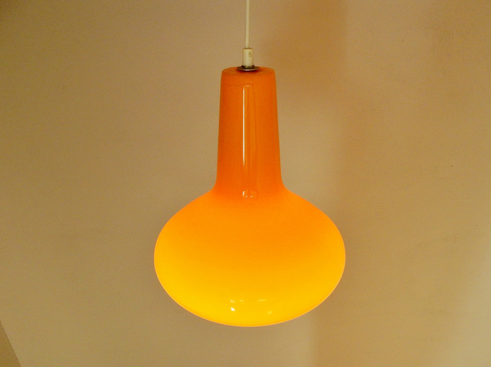 Orange italian glass pendant light by massimo vignelli for venini 1960s