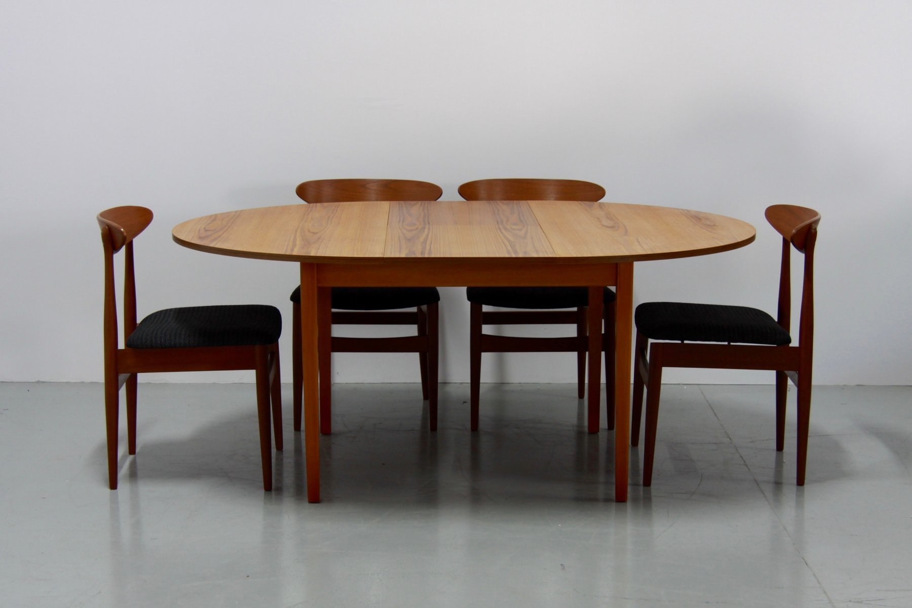 Teak Dining Table With Glass Top: A Blend Of Traditional And Modern