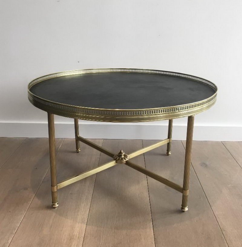 French Neoclical Style Round Coffee Table With Faux Leather Top French Neoclical Style Round Coffee Table With Faux Leather Top From Maison Jansen 1940s