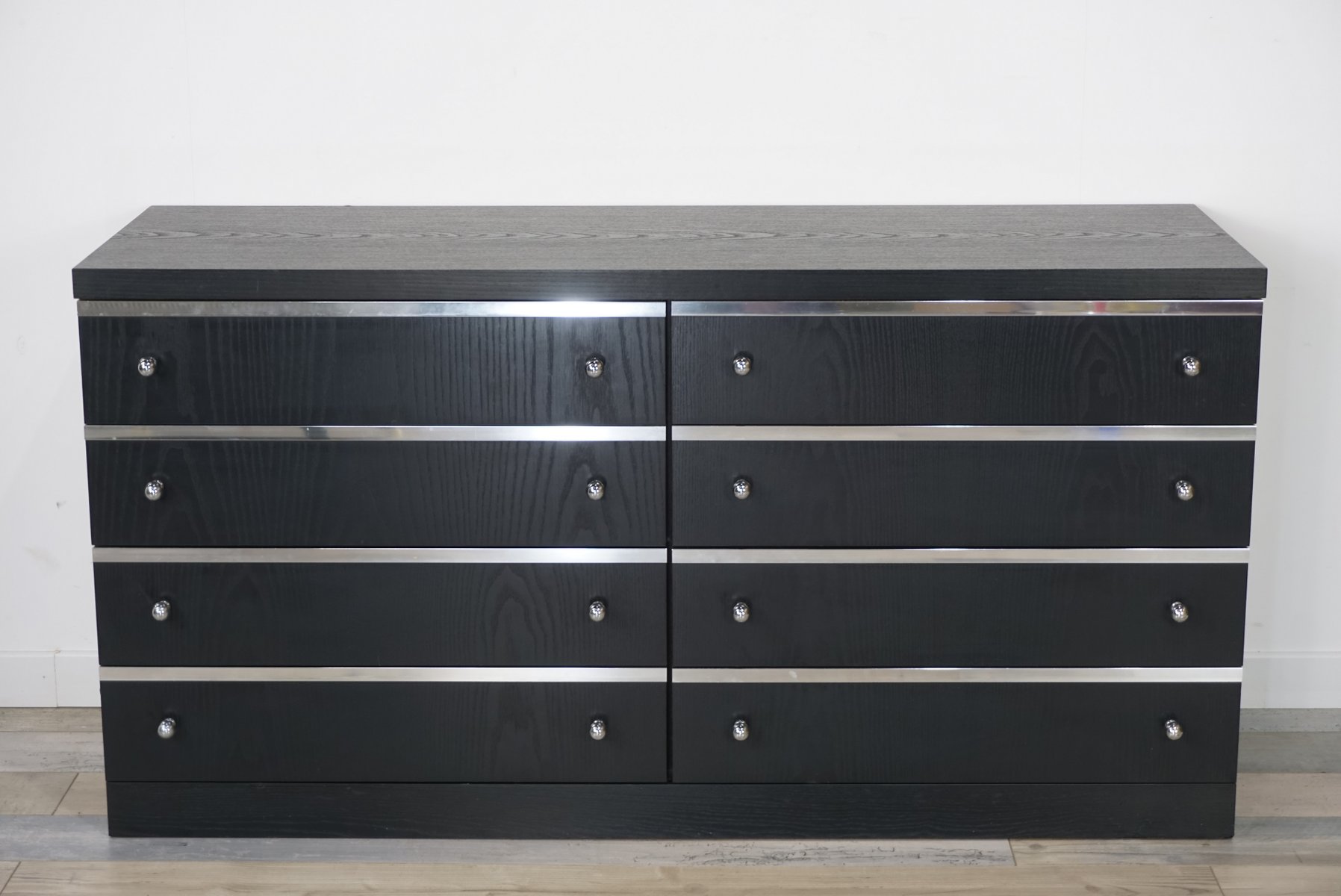 Long black vintage dresser with chrome details