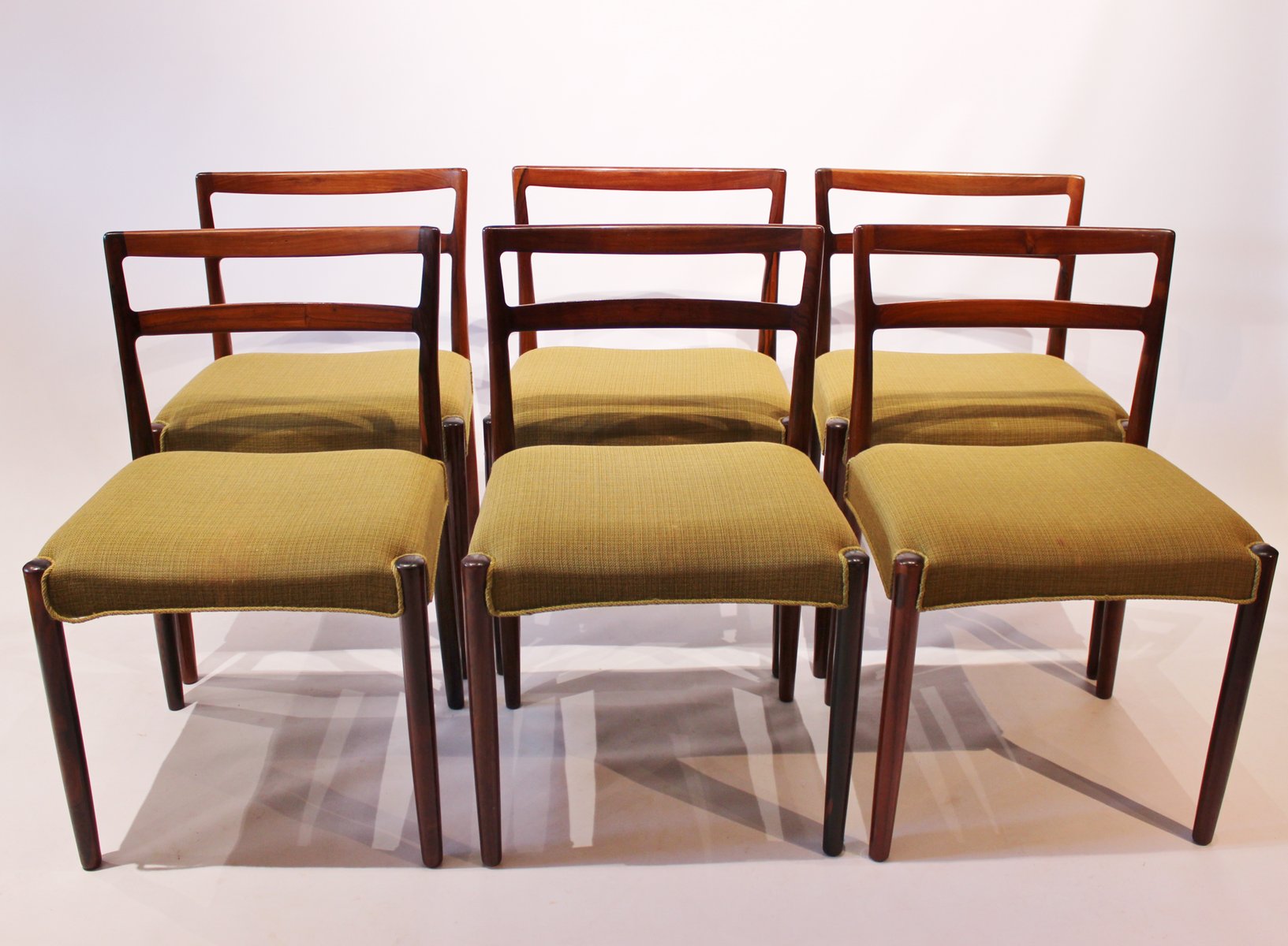 Sillas de comedor danesas de palisandro y tela verde de Knud Færch