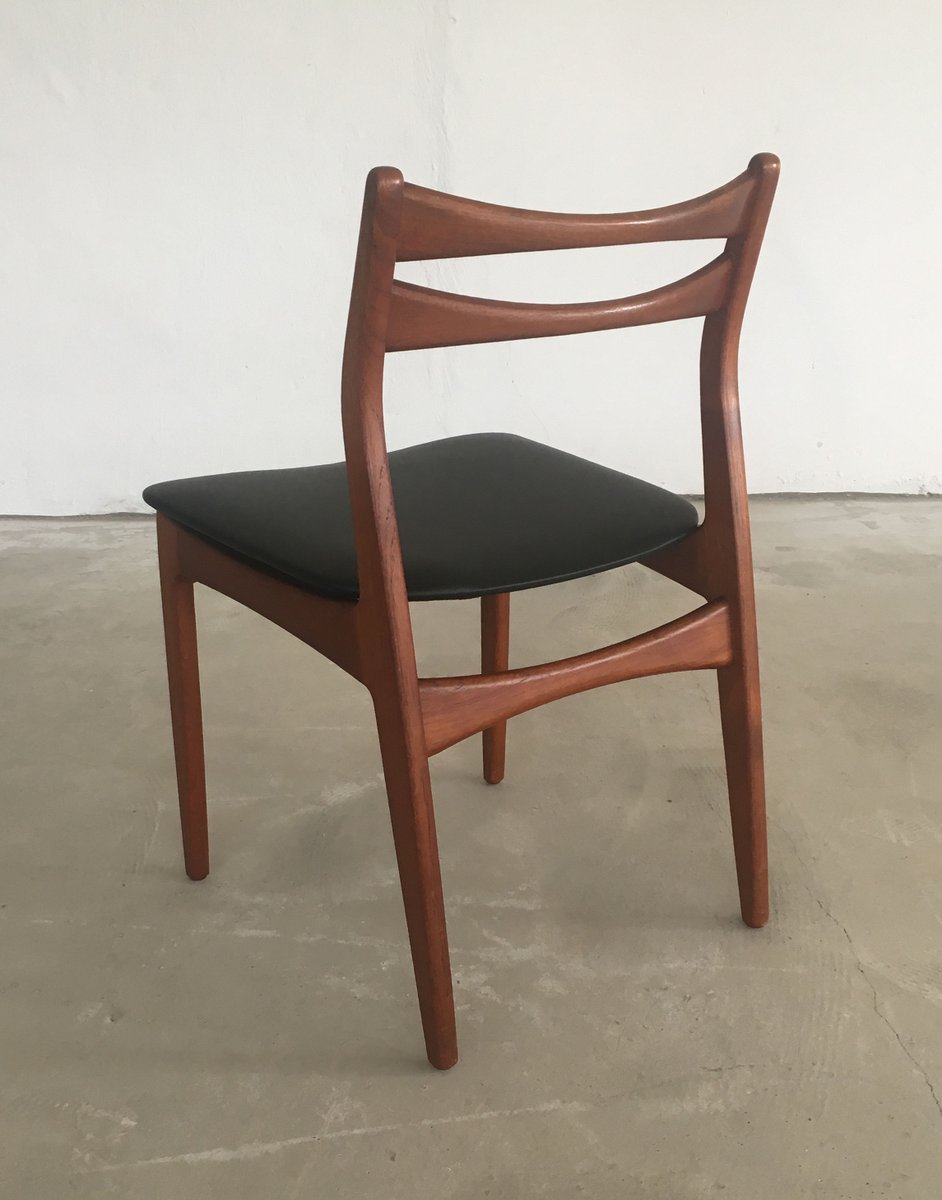 4 faux leather dining chairs